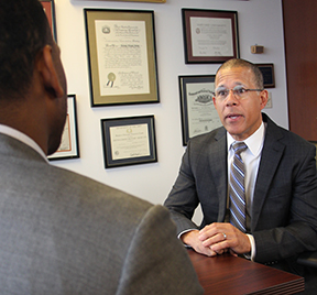 Attorney General Brown Interviewing a n employment candidate